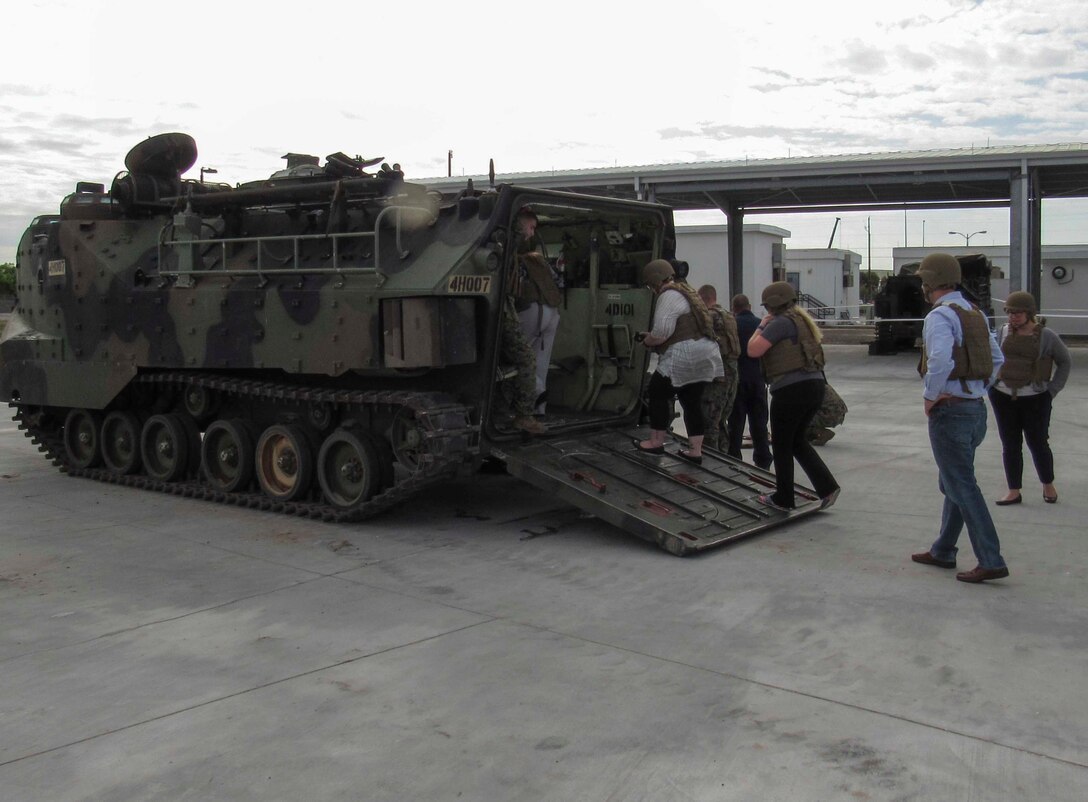 Employer Support of the Guard and Reserve members load in to an Amphibious Assault Vehicle from Headquarters and Service Company, 4th Assault Amphibian Battalion, 4th Marine Division, and are shown the basic functions of an Amphibious Assault Vehicle on March 2, 2018, in Tampa, Fla.