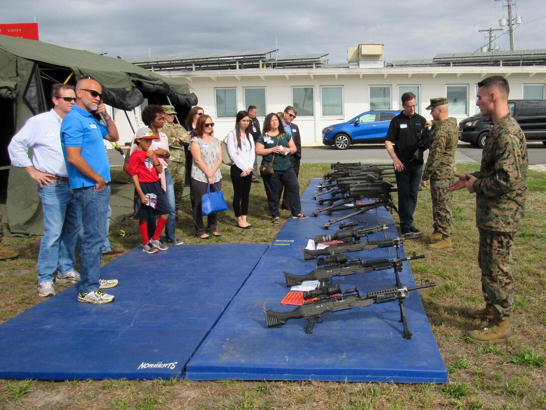 Marines from Headquarters and Service Company, 4th Assault Amphibian Battalion, 4th Marine Division, demonstrate the basic weapons system operations to members of the Employer Support of the Guard and Reserve on March 2, 2018, in Tampa, Fla.