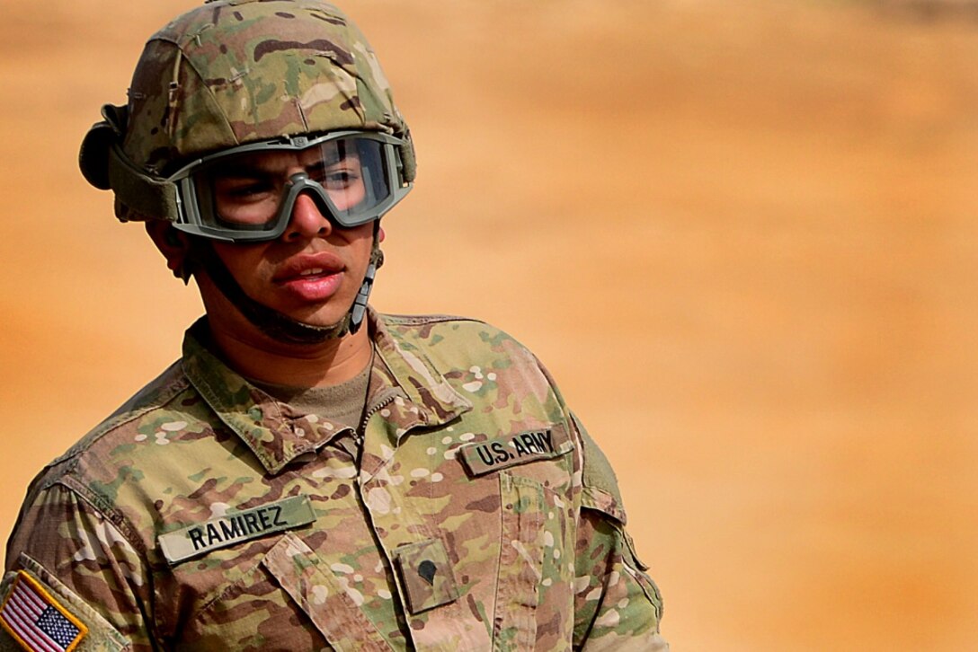 Army Spc. Ramon Ramirez, 5th Battalion, 7th Air Defense Artillery Regiment, conducts emplacement and system validation for the MIM-104 Patriot air defense missiles battery.