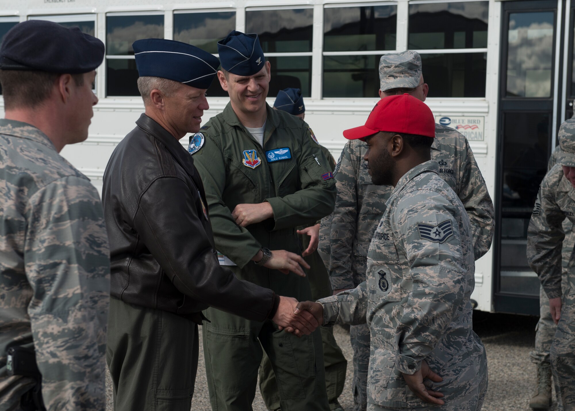 Lt. Gen. Mark Kelly, Commander of 12th Air Force and Air Forces Southern, coins Staff Sgt. David Ikner, 366th Security Forces Squadron combat arms training and maintenance instructor, during a base visit Mar. 5, 2017, at Mountain Home Air Force Base, Idaho. Ikner was awarded a coin for helping increase weapon qualifications throughout the wing. (U.S. Air Force photo by Airman 1st Class JaNae Capuno)