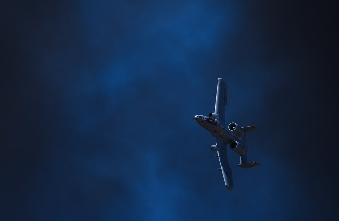 An A-10C Thunderbolt II performs aerial maneuvers during the annual Heritage Flight Training and Certification Course at Davis-Monthan Air Force Base, Ariz., March 3, 2018. Established in 1997, the course certifies civilian pilots of historic military aircraft and Air Force pilots to fly in formation during upcoming air shows. (U.S. Air Force photo by Airman 1st Class Frankie D. Moore)