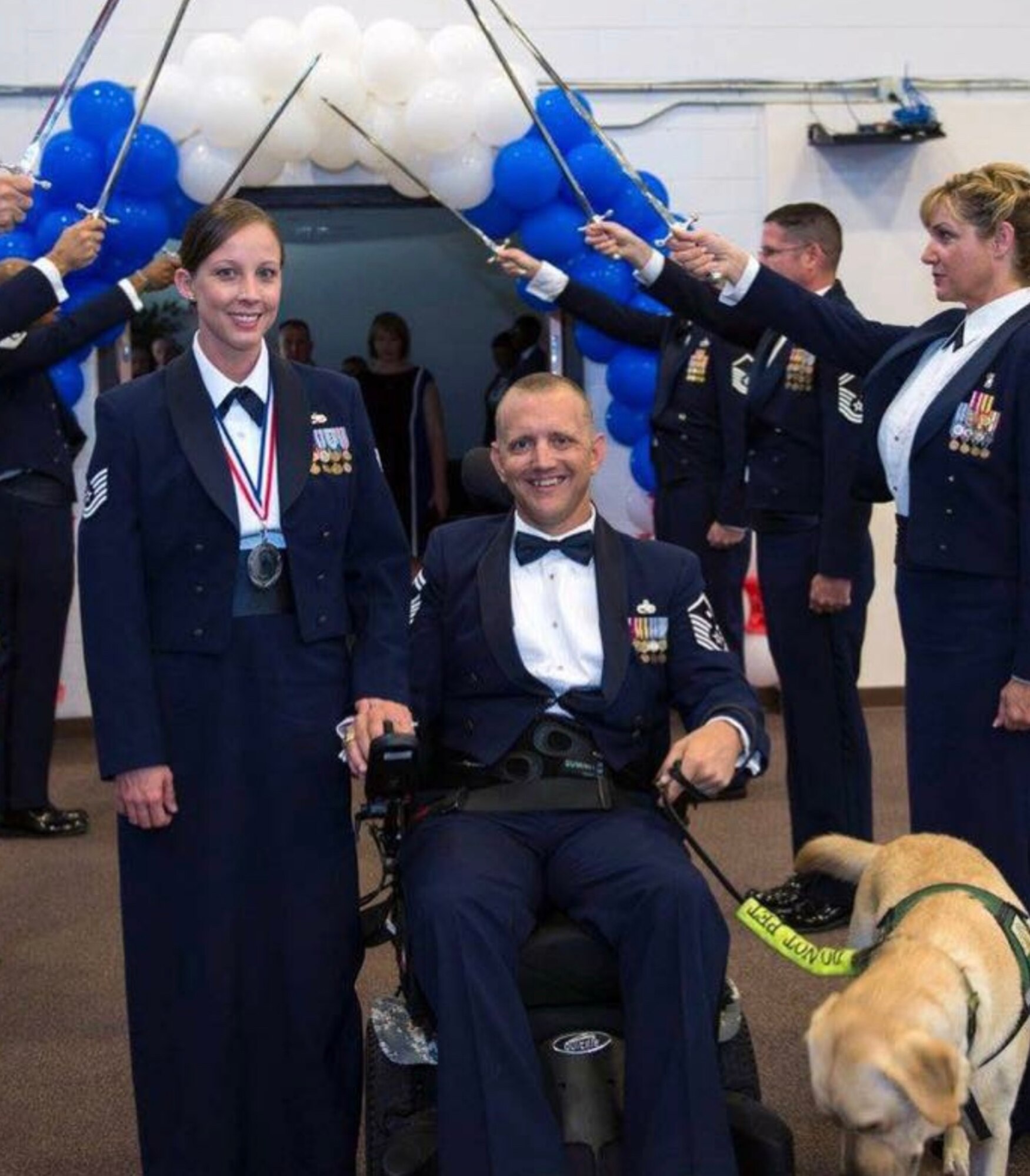 Master Sgt. Stephanie Ruepp, 38th Rescue Squadron unit training manager and resource advisor, and her husband Ret. Senior Master Sgt. Donal Ruepp, pose for a photo during her Senior NCO induction ceremony, in October 2016, at Moody Air Force Base, Ga. Ruepp has recently been announced as the Georgia representative for the Elizabeth Dole Foundation Military and Veteran caregiver fellows program. As a fellow, Ruepp will help caregivers provide anything to improve the quality of life for their loved one; from wheelchair accessible vehicles and home modifications to finding nearby support groups and treatment facilities. (Courtesy photo)