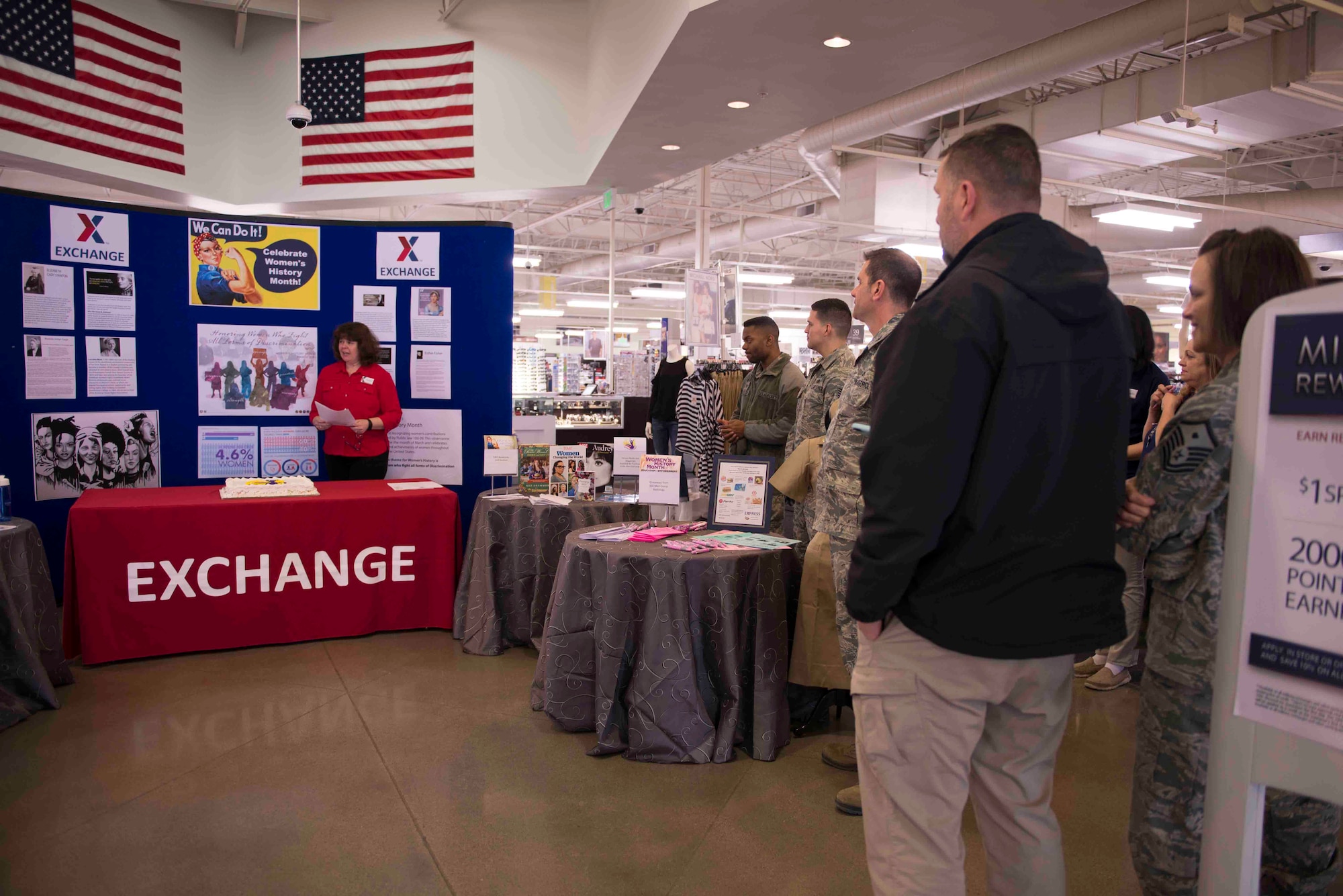 Jean Suprise, Army and Air Force Exchange Service human resource technician, reads the Women's History Month declaration at a cake cutting and recognition ceremony during International Women's Day March 8, 2018, at Mountain Home Air Force Base, Idaho. Between 1988 aand 1994, Congress passed additonal resolutions requesting and authorizing the President to proclaim March of each year as Women's History Month. (U.S. Air Force photo by Senior Airman Lauren-Taylor Levin)