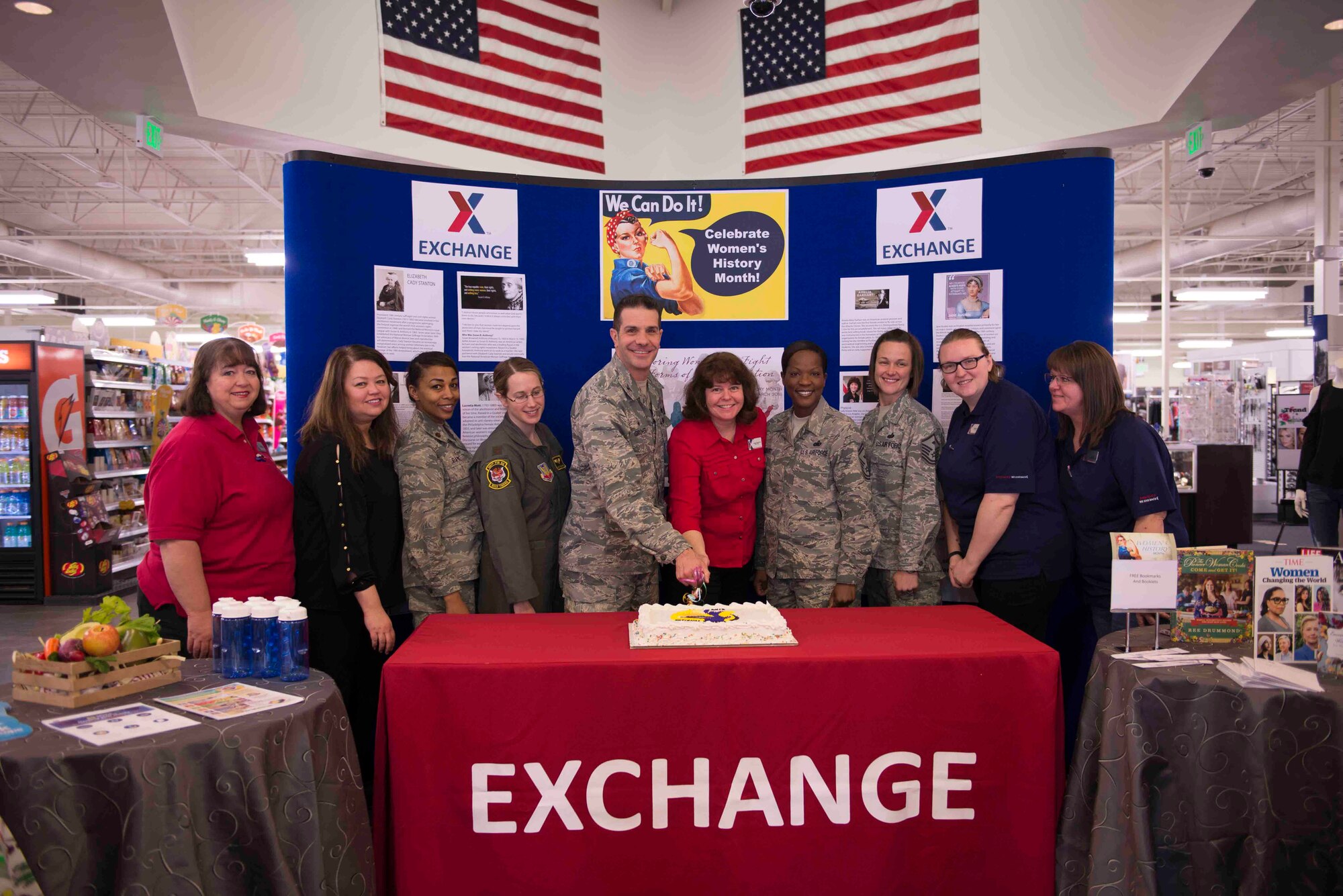 Col. Scott Grover, 366th Maintenance Group commander, and members of the base community participated in a cake cutting and recognition ceremony during International Women's Day March 8, 2018, at Mountain Home Air Force Base, Idaho. International Women's Day recognizes women for their achievements without regards to divisions, whether national, ethnic, linguistic, cultural, economic and political. (U.S. Air Force photo by Senior Airman Lauren-Taylor Levin)