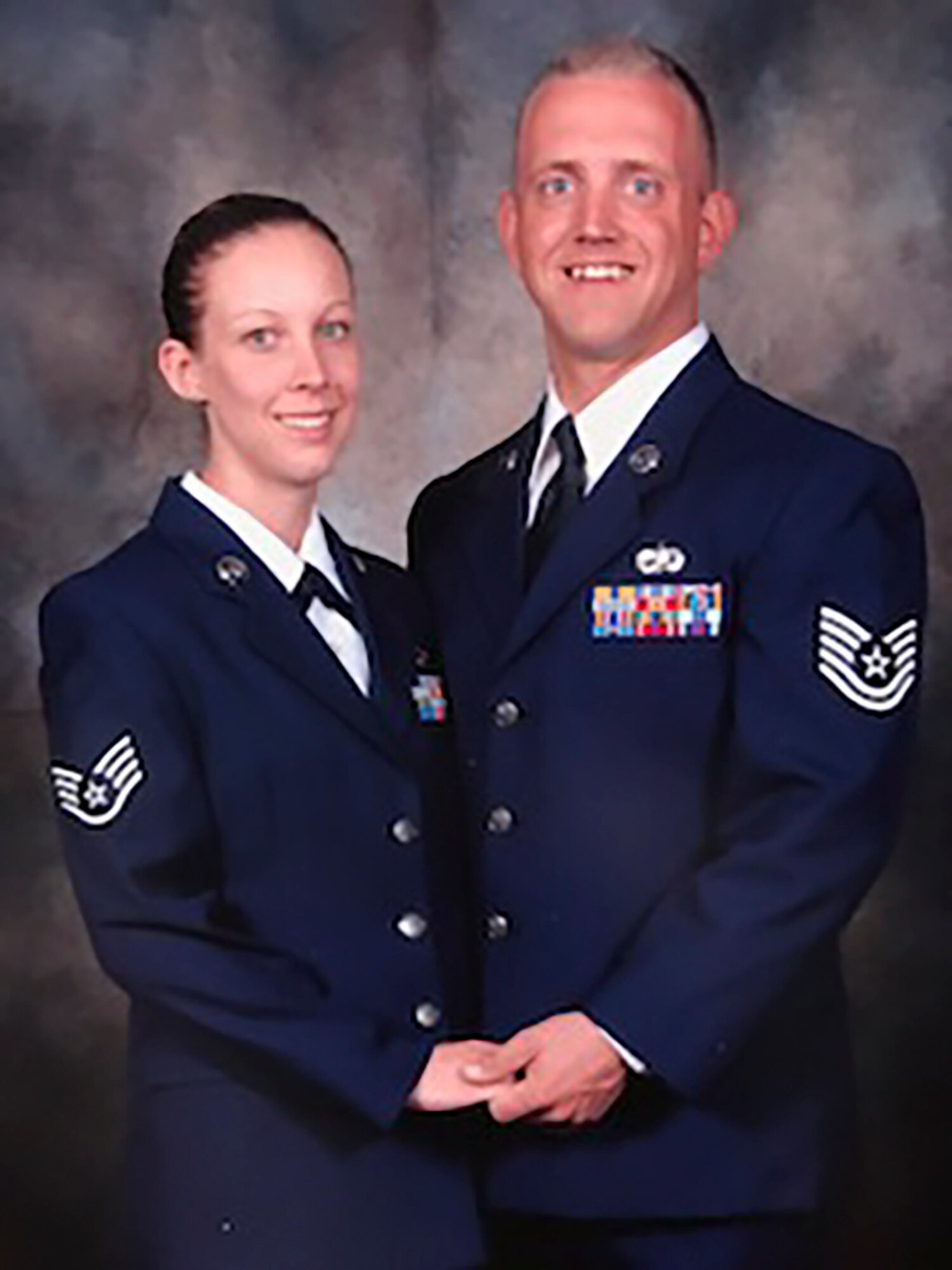 Master Sgt. Stephanie Ruepp, 38th Rescue Squadron unit training manager and resource advisor, and her husband Ret. Senior Master Sgt. Donal Ruepp, pose for a photo during a symposium in 2006, in San Antonio, Tx. Ruepp has recently been announced as the Georgia representative for the Elizabeth Dole Foundation Military and Veteran caregiver fellows program. As a fellow, Ruepp will help caregivers provide anything to improve the quality of life for their loved one; from wheelchair accessible vehicles and home modifications to finding nearby support groups and treatment facilities. (Courtesy photo)