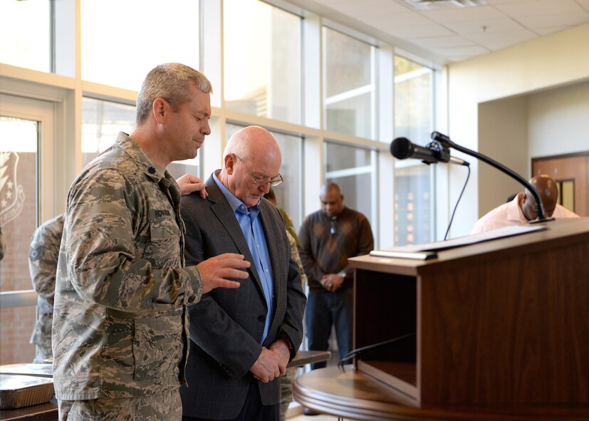 Chaplain (Lt. Col.) Steven Richardson, 14th Flying Training Wing Chaplain, and his father Retired Maj. Gen., Cecil Richardson, former Air Force Chief of Chaplains speak in prayer together March 6, 2018, on Columbus Air Force Base, Mississippi. Cecil Richardson spoke at six separate Squadron areas throughout the base’s National Prayer Breakfast week. (U.S. Air Force photo by Airman 1st Class Keith Holcomb)