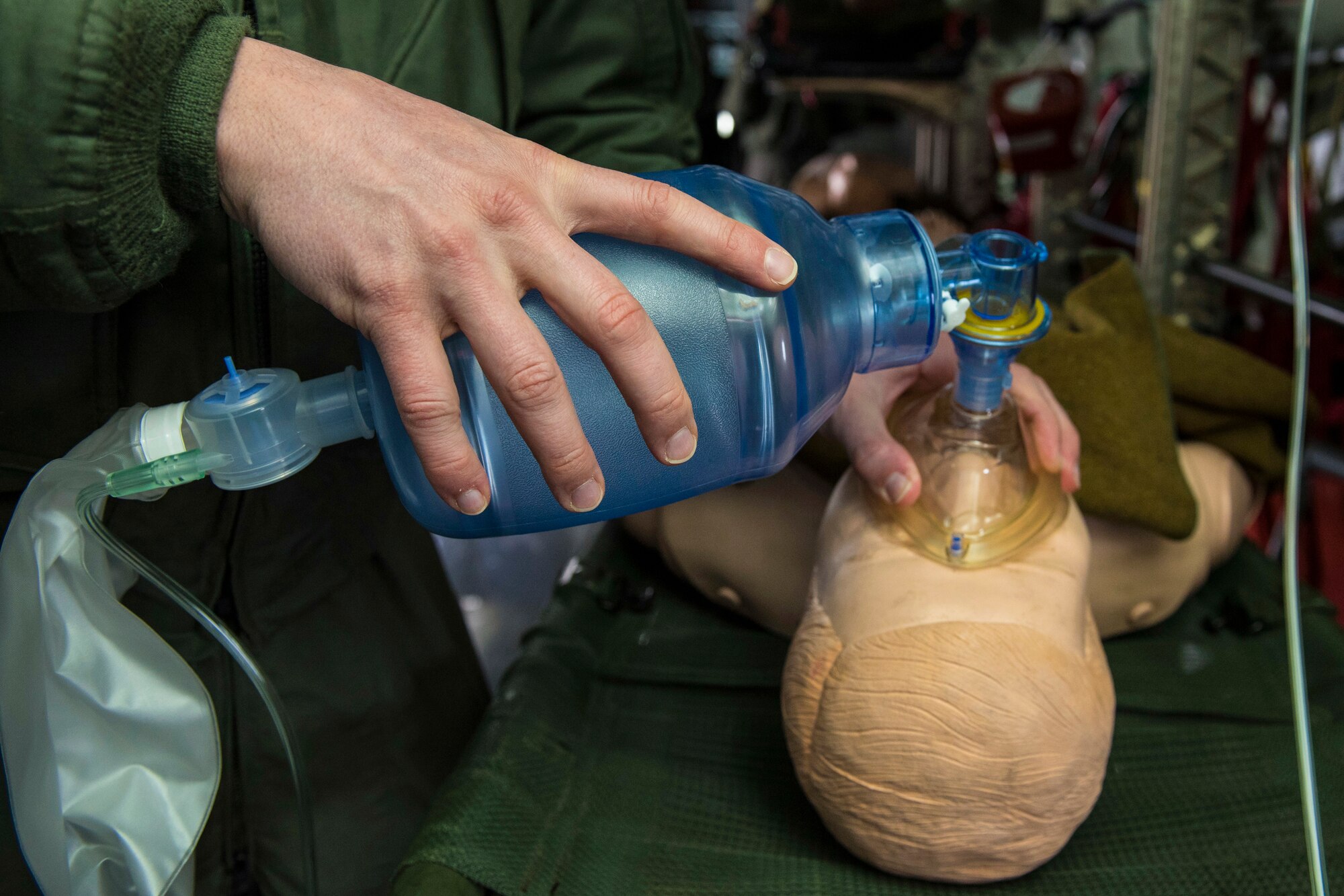 Airmen from the 375th Aeromedical Evacuation Squadron ensure proper functionality of medical equipment during an aeromedical evacuation training at Fairchild Air Force Base, Washington, March 1, 2018. During a mission, each piece of equipment is essential to providing critical care while transporting patients. (U.S. Air Force photo/Airman 1st Class Whitney Laine)