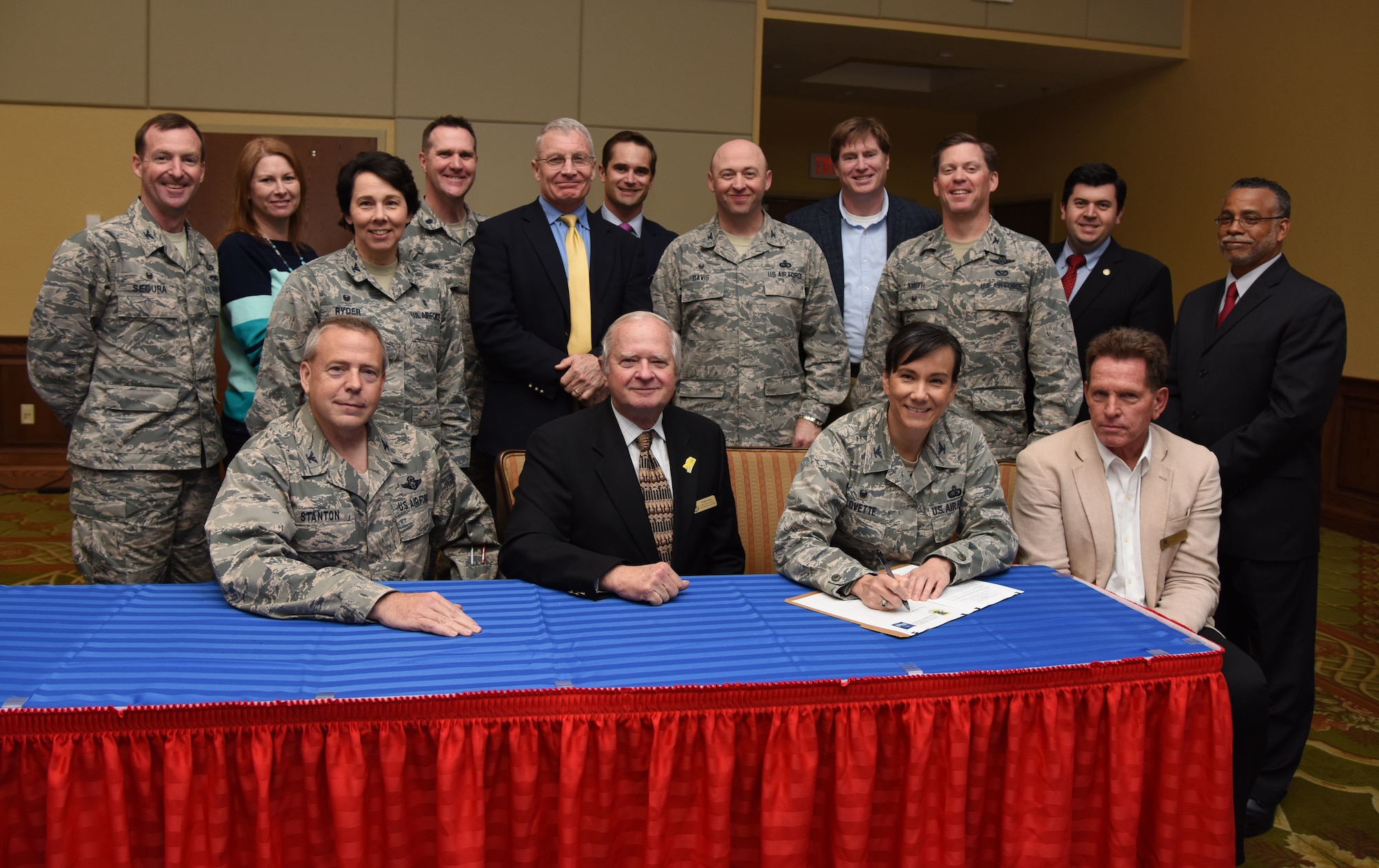 Col. Debra Lovette, 81st Training Wing commander, signs a memorandum of understanding between the 81st TRW and Mississippi Gulf Coast Community for the Keesler Community Partnership Program Agreement at the Bay Breeze Event Center March 7, 2018, on Keesler Air Force Base, Mississippi. The signing establishes a community partnership program on behalf of Keesler AFB mission partners with the Mississippi Gulf Coast community and local governments. (U.S. Air Force photo by Kemberly Groue)