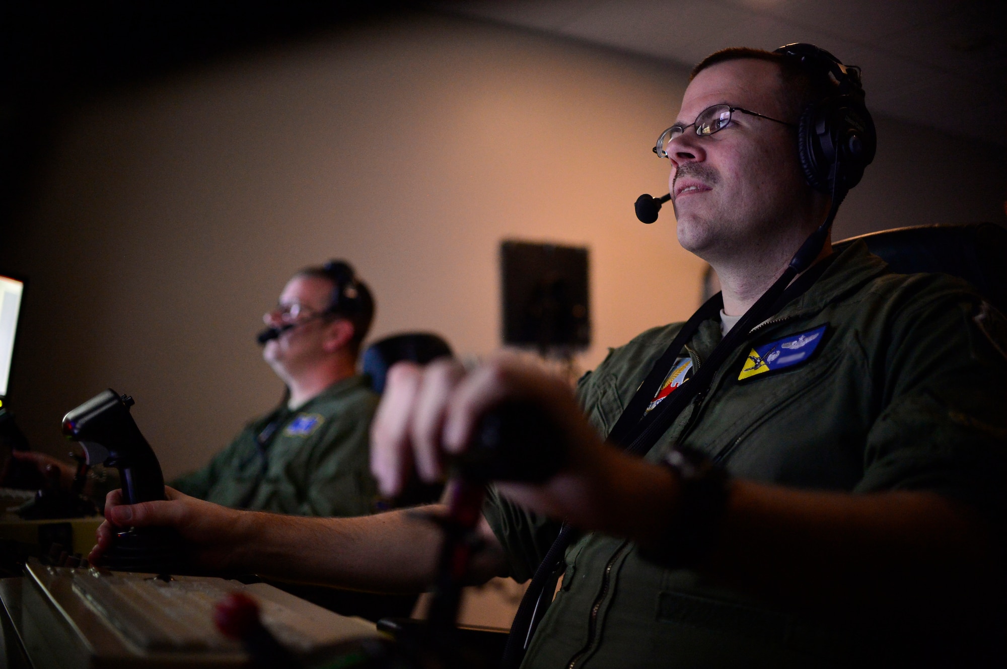 Lt. Col. Nicholas, 15th Attack Squadron commander, and Senior Master Sgt. Westley, 15th ATKS superintendent, fly the last MQ-1 Predator combat line, March 9, 2018, at Creech Air Force Base, Nev. Airmen have operated the MQ-1 for more than 20 years and provided intelligence, surveillance, reconnaissance and strike capabilities to the fight 24/7/365 across multiple areas of responsibilities. (U.S. Air Force photo by Senior Airman Christian Clausen)