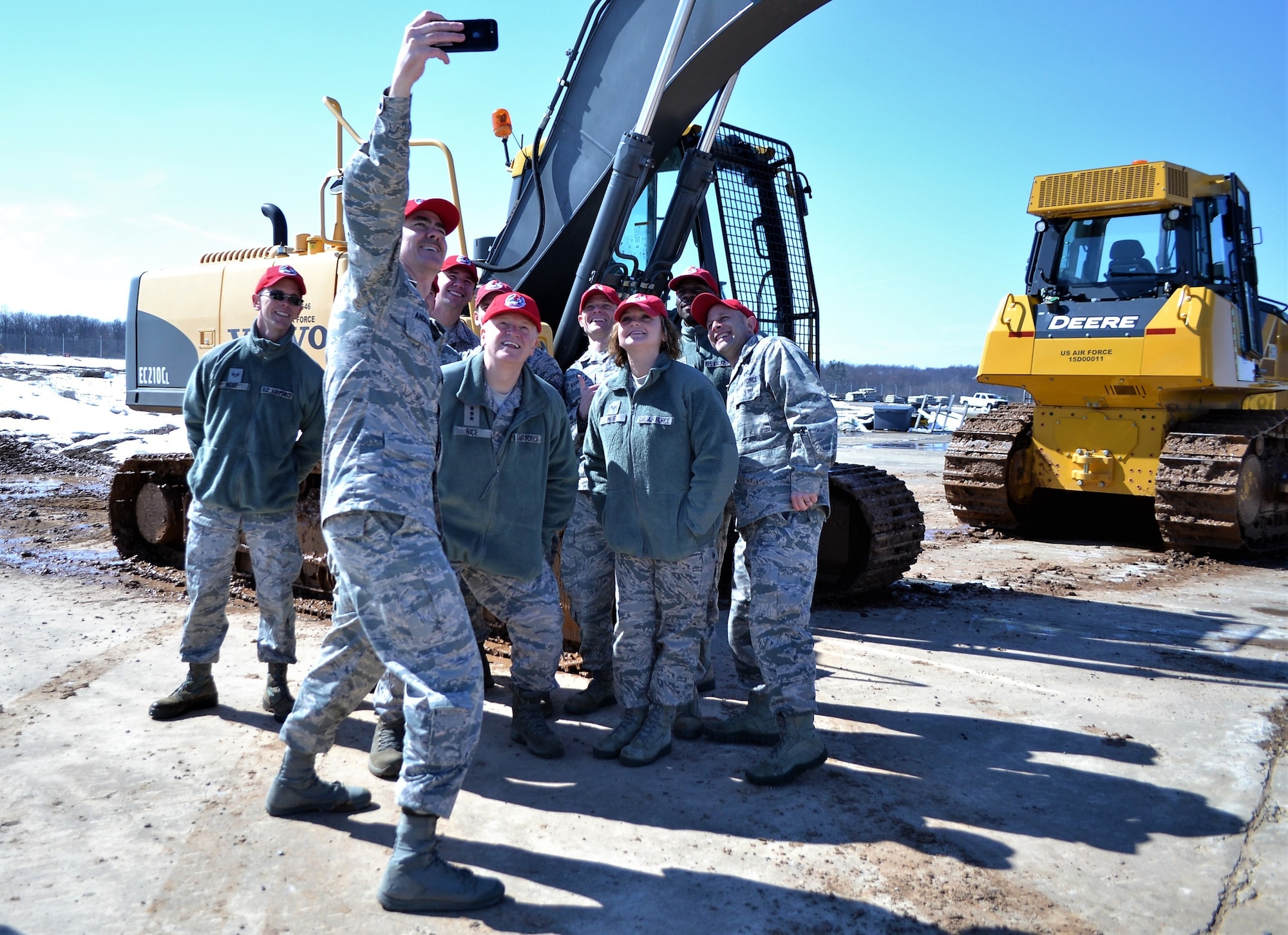 Chief Master Sgt. Ronald C. Anderson, command chief master sergeant of the Air National Guard, takes a selfie with members of the 201st Rapid Engineer Deployable Heavy Operational Repair Squadron Engineer Squadron, Det. 1, and Lt. Gen. L. Scott Rice, director of the ANG, Horsham Air Guard Station, March 11, 2018. The lieutenant general and command chief master sergeant received some hands-on experiences with the missions of various units in the 111th Attack Wing. (U.S. Air National Guard photo by Tech. Sgt. Andria Allmond)