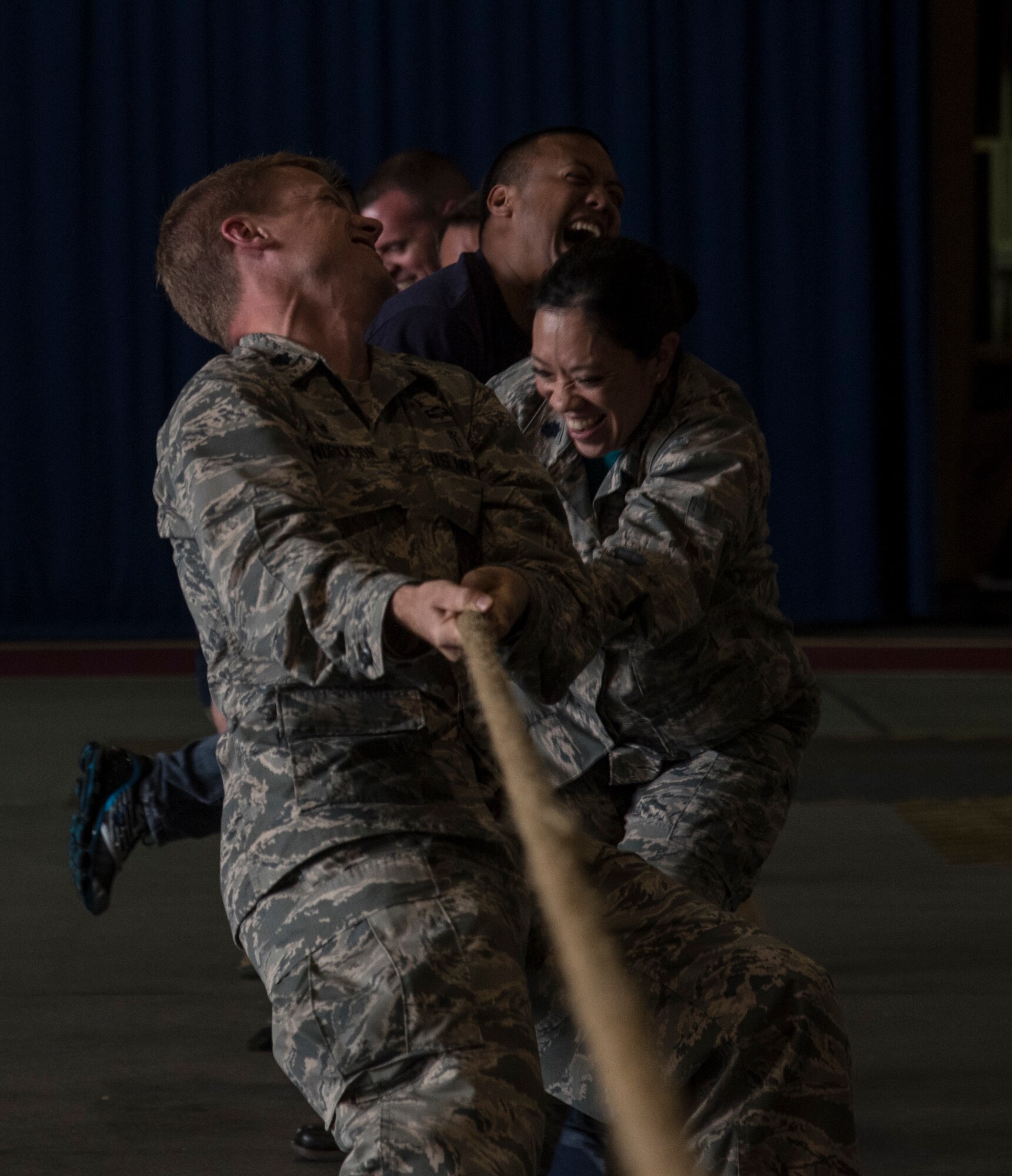 The 35th Fighter Wing leadership participates in a tug-o-war challenge during the first Team Misawa Resilient Relationships and Appreciation Day, at Misawa Air Base, Japan, Aug. 18, 2017. The event, hosted by the 35th Fighter Wing Chapel Corps, afforded personnel an opportunity to see their squadron leaders participate in a resiliency challenge as they closed out the day leading by example. According to Air Force assessments on Airmen, ensuring all personnel exercise mental, physical, social and spiritual activities in their life, in and out of work, leads to a well-performing, mission ready Airmen who can better execute tasks. (U.S. Air Force photo by Senior Airman Sadie Colbert)