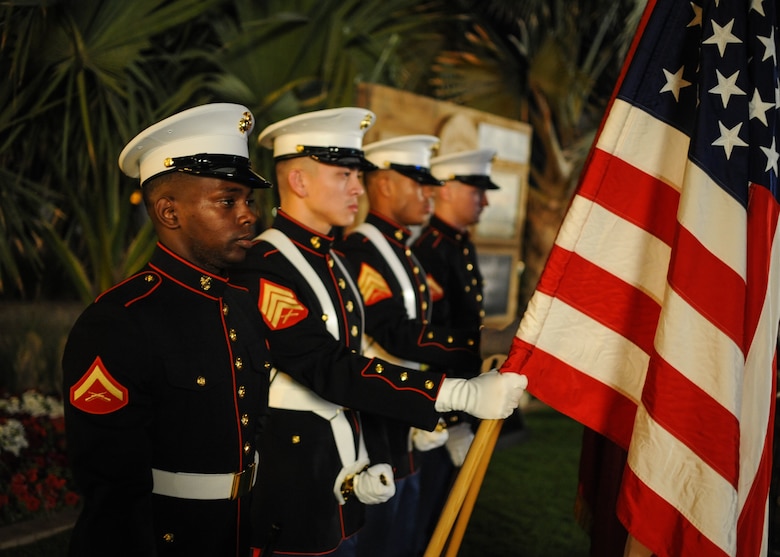 U.S. Marines deployed to the United Arab Emirates present the U.S. Flag during the U.S. National Day March 7, 2018 at the Ritz-Carlton Hotel and Resort, Dubai. The United States Independence Day is celebrated in the early months of the year for citizens to take advantage. (U.S. Air National Guard Photo by Staff Sgt. Colton Elliott)