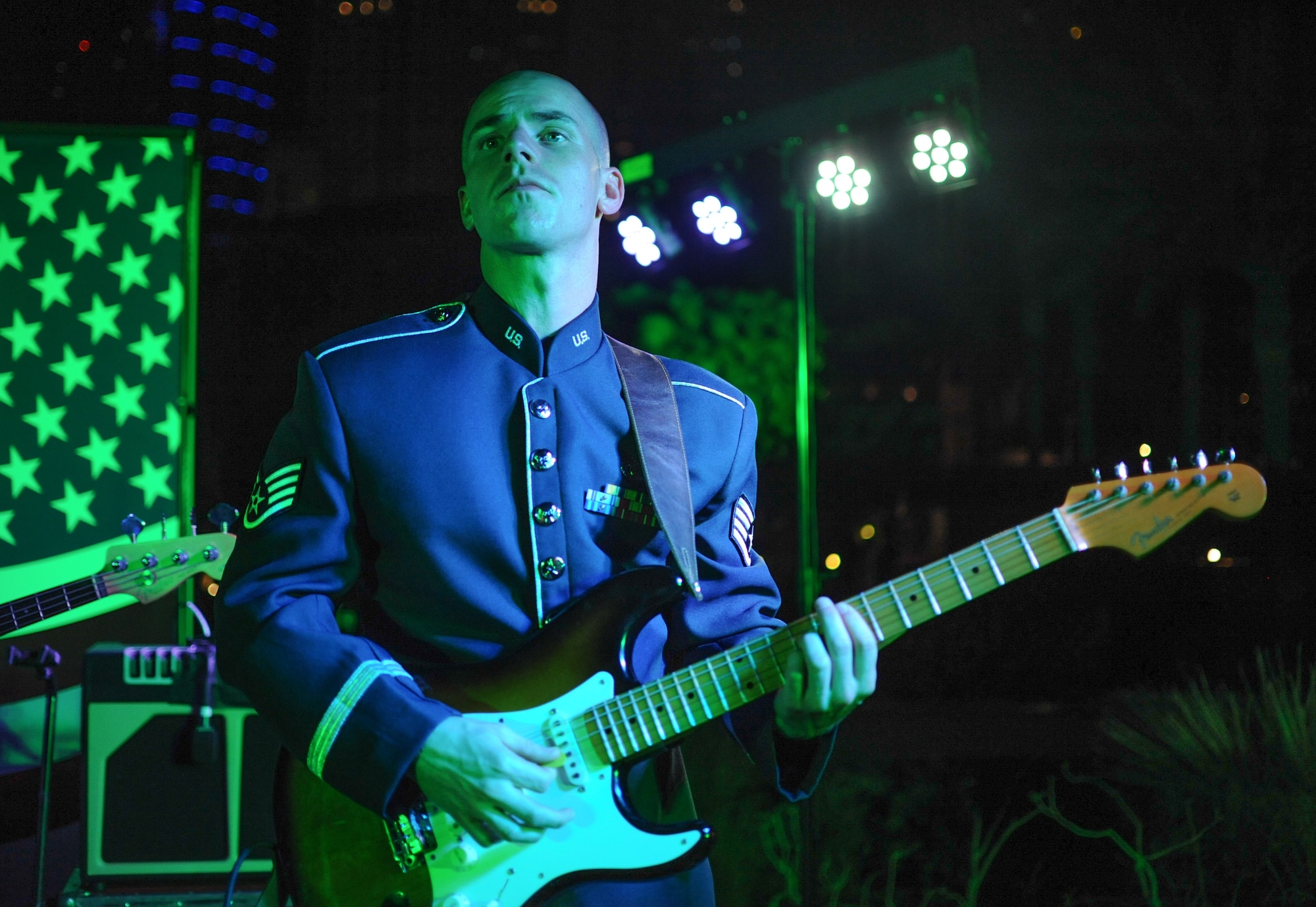 U.S Air Force Staff Sgt. Andrew Thompson, U.S. Air Forces Central Command band member performs during the United States National Day March 7, 2018 at the Ritz-Carlton Hotel and Resort, Dubai. The band collaborates with U.S. Embassies throughout southwest Asia to share American culture, build partnerships and develop relationships. (U.S. Air National Guard Photo by Staff Sgt. Colton Elliott)