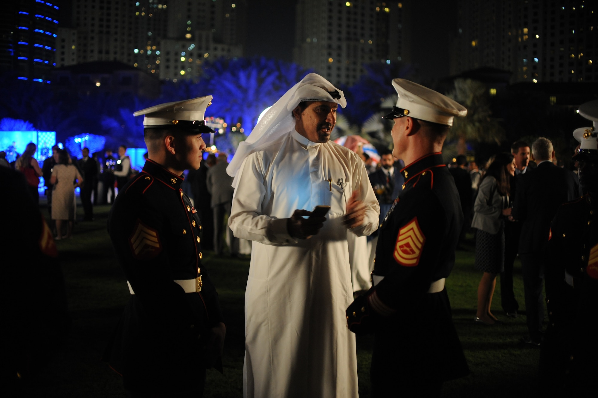 U.S. Marines deployed to the United Arab Emirates talk with Emirates during the United States National Day March 7, 2018 at the Ritz-Carlton Hotel and Resort, Dubai. Strengthen Allies & Partnerships is one of the U.S. Central Commands top priorities in the region. (U.S. Air National Guard Photo by Staff Sgt. Colton Elliott)