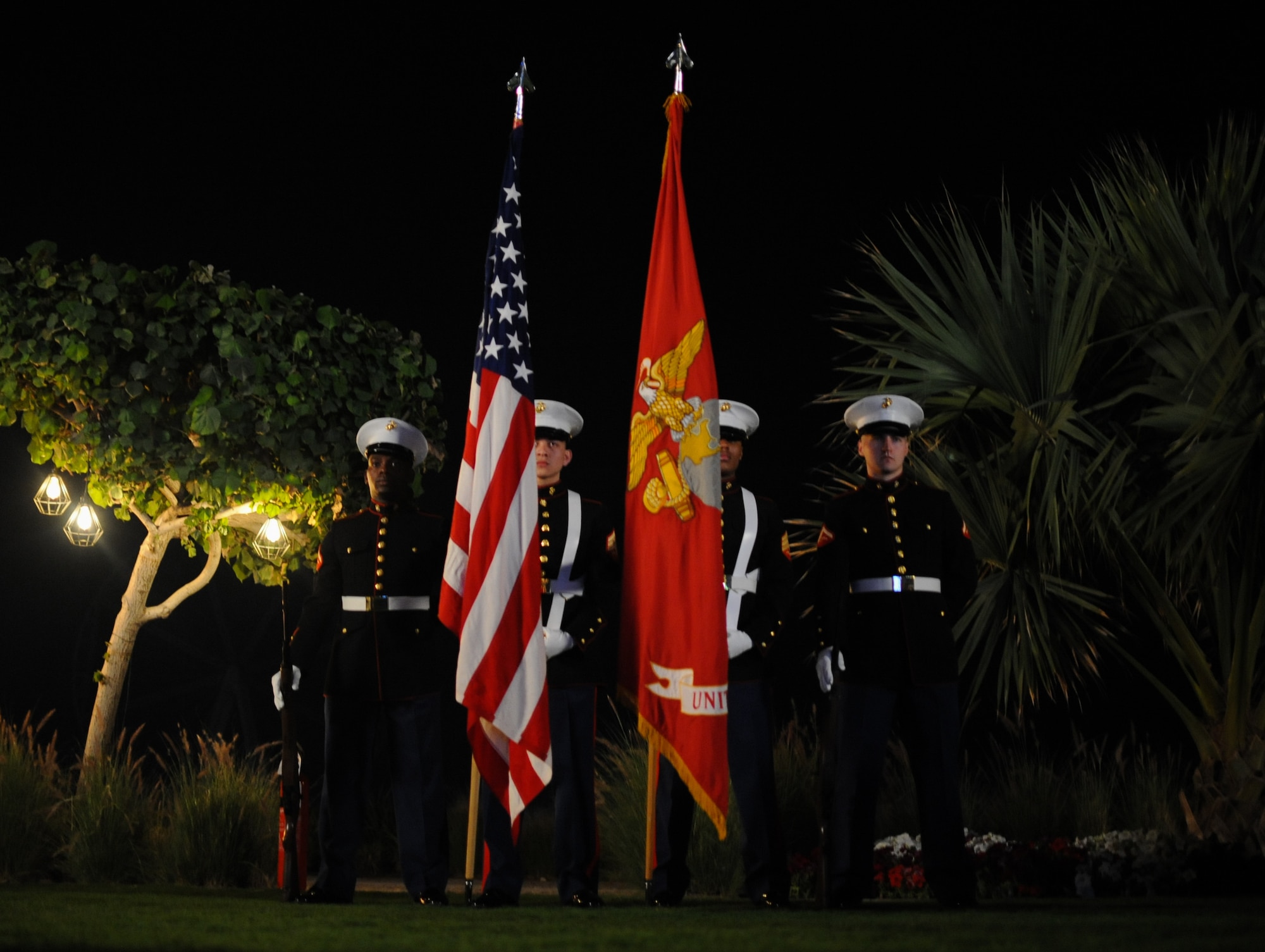 U.S. Marines deployed to the United Arab Emirates present the U.S. Flag during the U.S. National Day March 7, 2018 at the Ritz-Carlton Hotel and Resort, Dubai. The United States Independence Day is celebrated in the early months of the year for citizens to take advantage of cooler weather. (U.S. Air National Guard Photo by Staff Sgt. Colton Elliott)