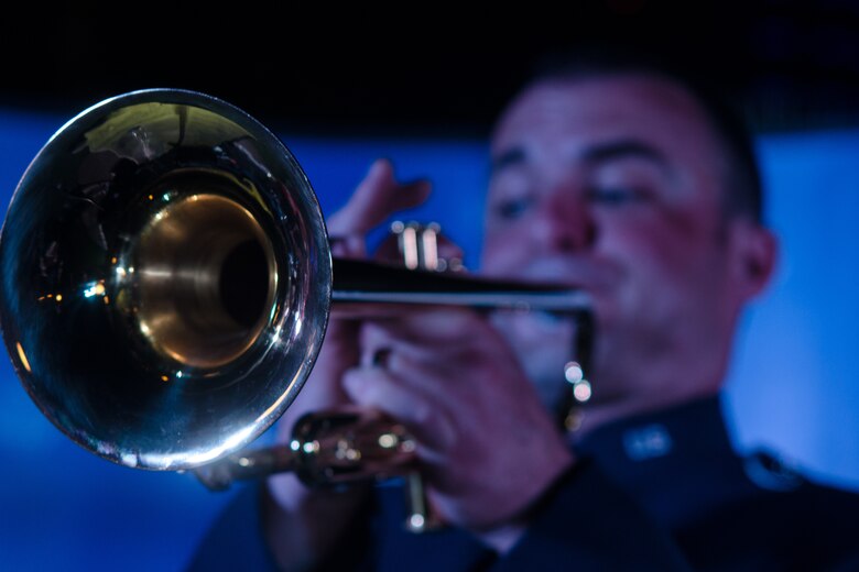 U.S Air Force Staff Sgt. Leslie Dix, U.S. Air Forces Central Command band member performs during the United States National Day March 7, 2018 at the Ritz-Carlton Hotel and Resort, Dubai. The U.S .AFCENT is a popular music ensemble comprised of American Airman who are charged with using music to bring diverse peoples from different cultures together to engender mutual appreciation and respect. (U.S. Air National Guard Photo by Staff Sgt. Colton Elliott)
