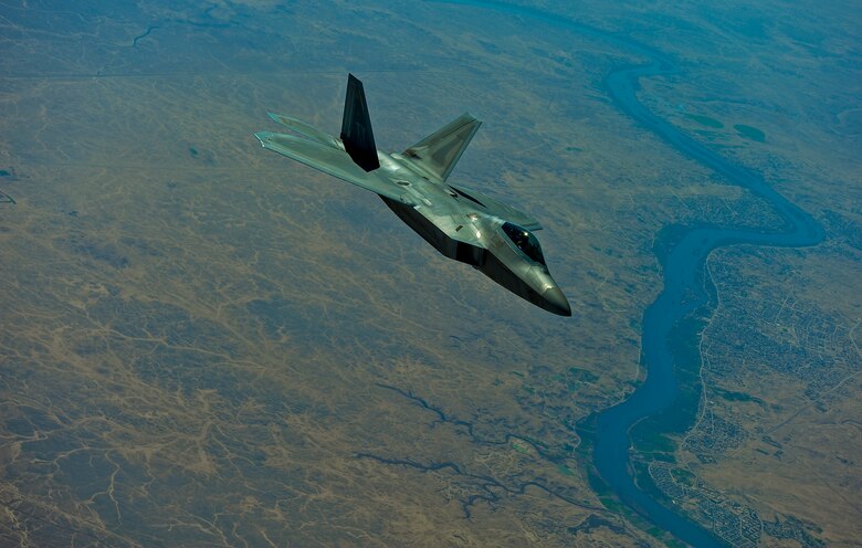 A U.S. Air Force F-22 assigned to the 380th Air Expeditionary Wing, Al Dhafra Air Base, United Arab Emirates disconnects from a KC-10 Extender after receiving fuel over Syria March 2,2018.
 The F-22s provide close air support and precision guided strikes in an effort to weaken and destroy ISIS operations in the Middle East and around the world.
 (U.S. Air Force photo by Tech. Sgt. Anthony Nelson Jr.)