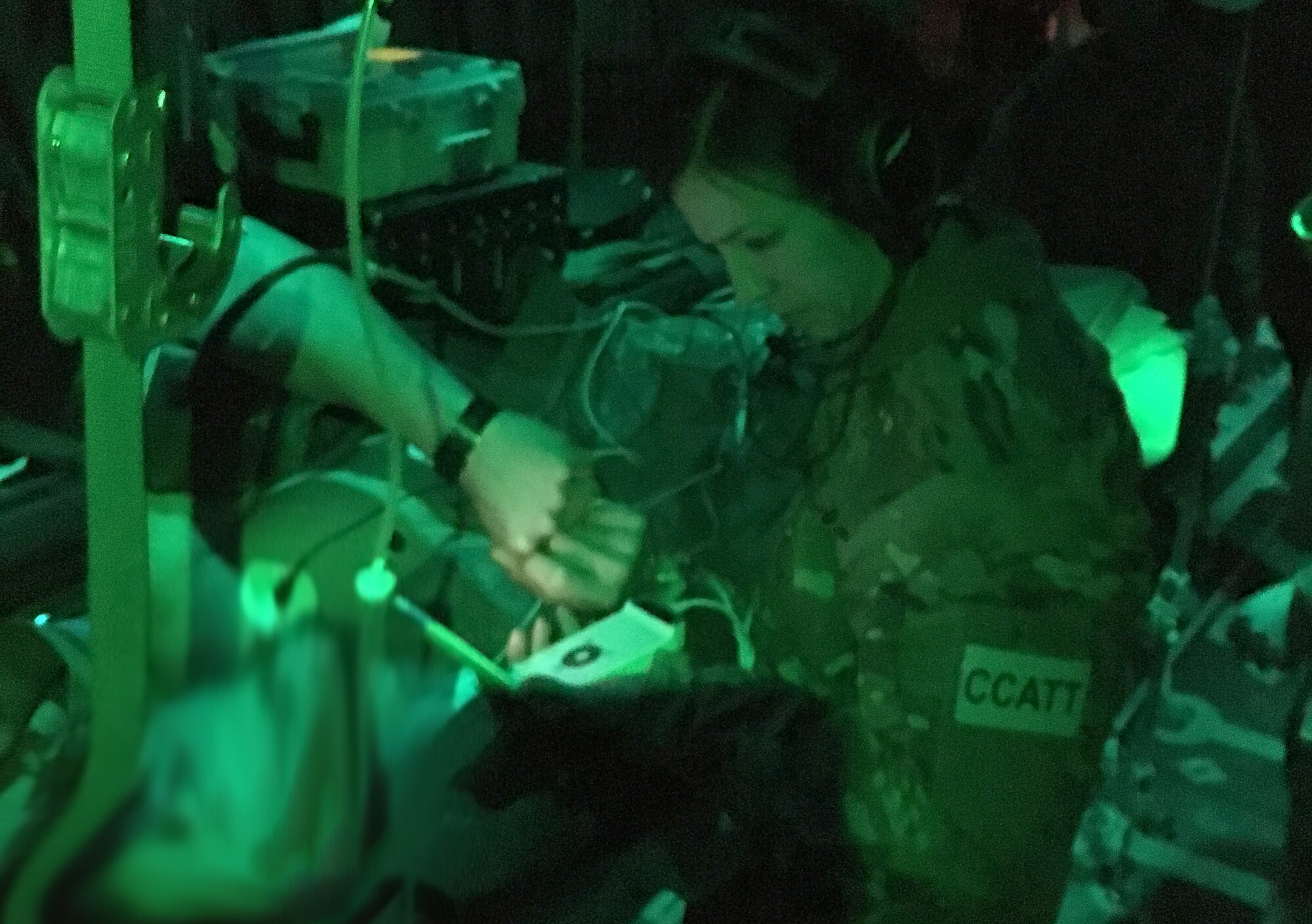 A 455th Expeditionary Aeromedical Evacuation Squadron Critical Care Air Transport Team member, monitors a patient during a mission in late February.