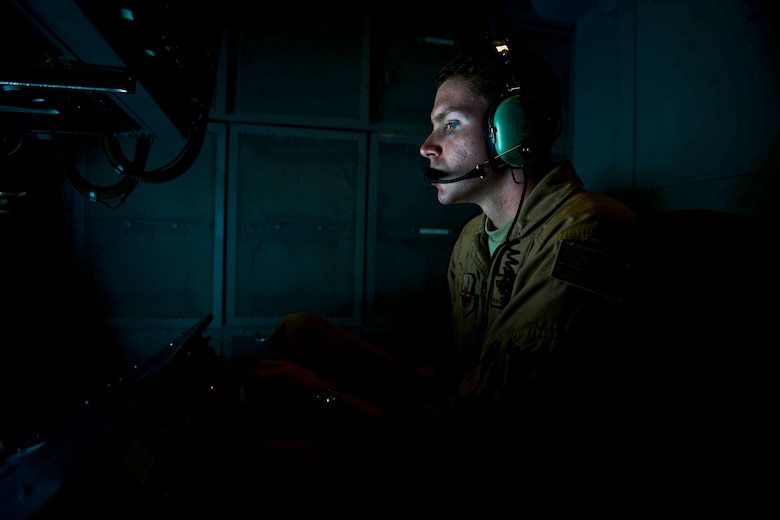 U.S. Air Force Senior Airman Ben Leclerc in-flight refueler, maneuvers and extends the boom to make contact with the receptacle of an U.S. Air Force F-16 assigned to the 455th Air Expeditionary Wing, Bagram Airfield, Afghanistan, while flying over Afghanistan, March 9,2018.
 Leclerc is deployed from the 60th Air Mobility Wing, Travis Air Force Base, California. 
 (U.S. Air Force photo by Tech. Sgt. Anthony Nelson Jr.)