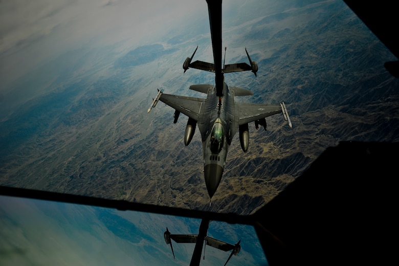 A U.S. Air Force F-16 Fighting Falcon assigned to the 455th Air Expeditionary Wing, Bagram Airfield, Afghanistan receives fuel over Afghanistan from a KC-10 Extender, March 9,2018.
 The F-16 can locate targets in all weather conditions and detect low flying aircraft in radar ground clutter. 
 (U.S. Air Force photo by Tech. Sgt. Anthony Nelson Jr.)