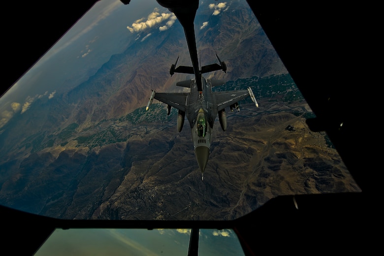 A U.S. Air Force F-16 Fighting Falcon assigned to the 455th Air Expeditionary Wing, Bagram Airfield, Afghanistan receives fuel over Afghanistan from a KC-10 Extender, March 9, 2018.
 The F-16 is part of the Air component arsenal for the U.S. Air Force Central Command providing integrated air defense and deterrent capabilities in the region. 
 (U.S. Air Force photo by Tech. Sgt. Anthony Nelson Jr.)