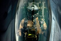 A U.S. Air Force F-16 Fighting Falcon pilot assigned to the 455th Air Expeditionary Wing, Bagram Airfield, Afghanistan prepares to receive fuel over Afghanistan from a KC-10 Extender, March 9, 2018.
 The 455th AEW is the premier counter terrorism wing that enables a successful Train, Advise, and Assist campaign. 
 (U.S. Air Force photo by Tech. Sgt. Anthony Nelson Jr.)