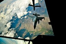 A U.S. Air Force F-16 Fighting Falcon assigned to the 455th Air Expeditionary Wing, Bagram Airfield, Afghanistan detaches after receiving fuel over Afghanistan from a KC-10 Extender, March 9, 2018.
 The F-16 is part of the Air component arsenal for the U.S. Air Force Central Command providing integrated air defense and deterrent capabilities in the region. 
 (U.S. Air Force photo by Tech. Sgt. Anthony Nelson Jr.)