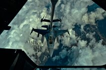 A U.S. Air Force F-16 Fighting Falcon pilot assigned to the 455th Air Expeditionary Wing, Bagram Airfield, Afghanistan prepares to receive fuel over Afghanistan from a KC-10 Extender, March 9, 2018.
 The F-16 maneuverability and combat radius exceed that of all potential threat fighter aircraft. 
 (U.S. Air Force photo by Tech. Sgt. Anthony Nelson Jr.)