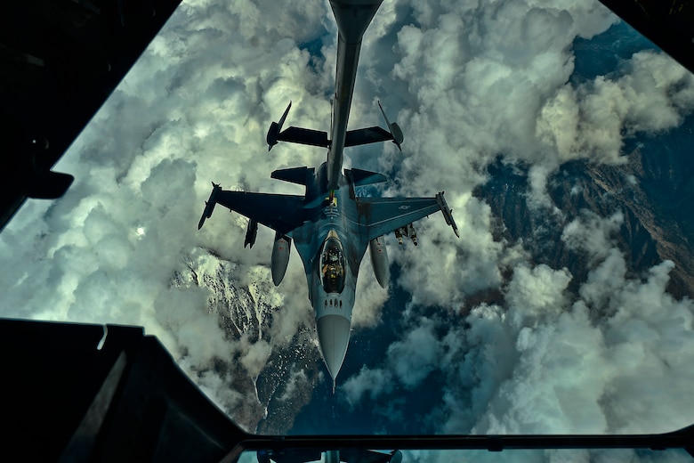 A U.S. Air Force F-16 Fighting Falcon pilot assigned to the 455th Air Expeditionary Wing, Bagram Airfield, Afghanistan prepares to receive fuel over Afghanistan from a KC-10 Extender, March 9, 2018.
 The F-16 maneuverability and combat radius exceed that of all potential threat fighter aircraft. 
 (U.S. Air Force photo by Tech. Sgt. Anthony Nelson Jr.)