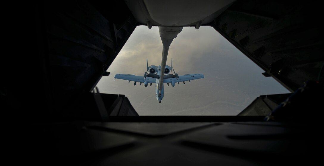 A U.S. Air Force A-10 Thunderbolt II assigned to Kandahar Airfield, Afghanistan
 prepares to receive fuel over Afghanistan from a KC-10 Extender, March 9, 2018.
 The Thunderbolt employs a wide variety of conventional munitions in support of ORS and the defeat of ISIS. 
 (U.S. Air Force photo by Tech. Sgt. Anthony Nelson Jr.)