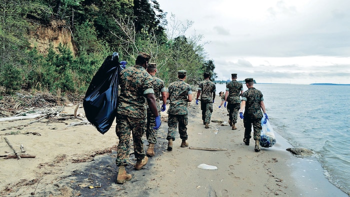 It is also the responsibility of Marines to ensure the integrity of the natural landscapes aboard base. During last year's Earth Day festivities Marines gathered at the shoreline to ensure the base was clean on both land and sea.