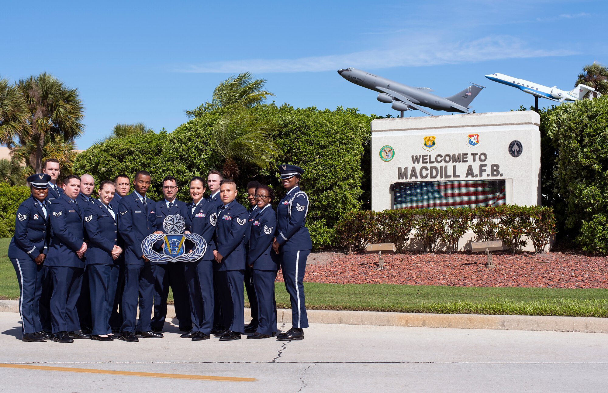Members of the Host Aviation Resource Management (HARM) office pause for a photo at MacDill Air Force Base, Fla., March 7, 2018. The HARM office was recently recognized as the Air Force Outstanding Aviation Resource Management Sergeant Dee Campbell Small Unit of the Year for the 2017 fiscal year.