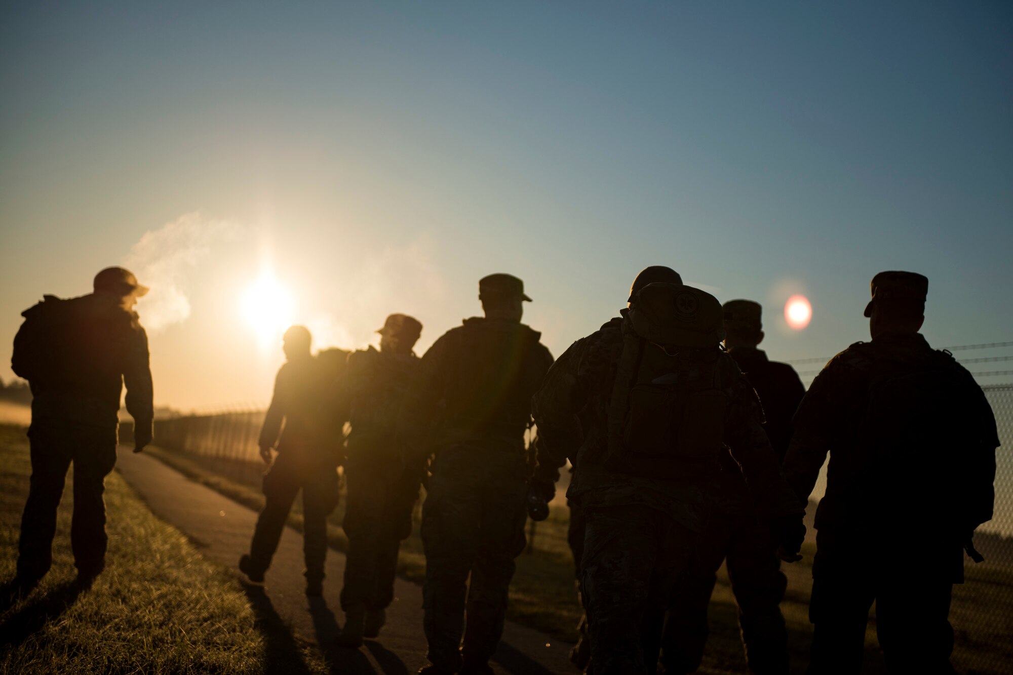 Airmen from the 347th Operations Support Squadron (OSS) participate in a ruck march during a Comprehensive Airman Fitness (CAF) Day, March 9, 2018, at Moody Air Force Base, Ga. During CAF Day, the 347th OSS focused on the physical domain, bolstering resiliency through team building activities. (U.S. Air Force photo by Airman 1st Class Erick Requadt)