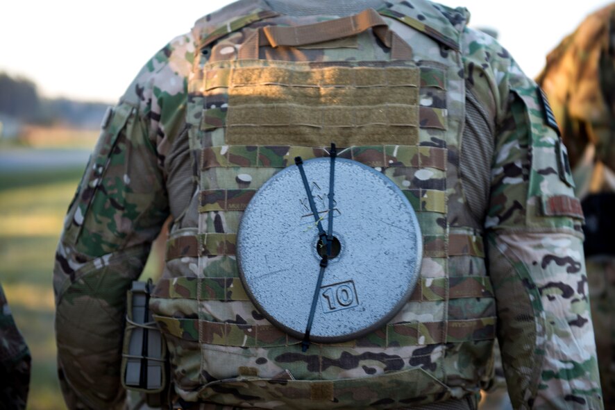 An Airman from the 347th Operations Support Squadron (OSS) participates in a ruck march during a Comprehensive Airman Fitness (CAF) Day, March 9, 2018, at Moody Air Force Base, Ga. During CAF Day, the 347th OSS focused on the physical domain, bolstering resiliency through team building activities. (U.S. Air Force photo by Airman 1st Class Erick Requadt)