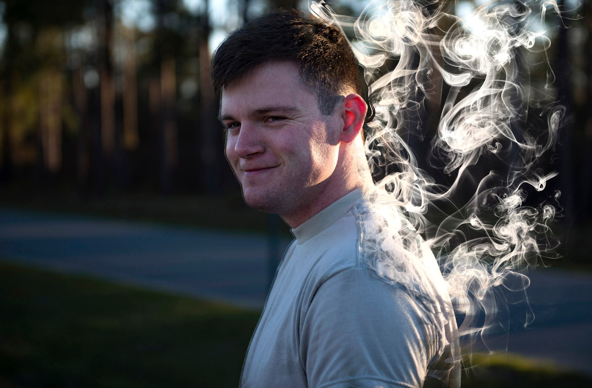 Airman 1st Class Zachary Rollins 347th Operations Support Squadron (OSS) aircrew flight equipment technician, poses for a photo while participating in a ruck march during a Comprehensive Airman Fitness (CAF) Day, March 9, 2018, at Moody Air Force Base, Ga. During CAF Day, the 347th OSS focused on the physical domain, bolstering resiliency through team building activities. (U.S. Air Force photo illustration  by Airman 1st Class Erick Requadt)