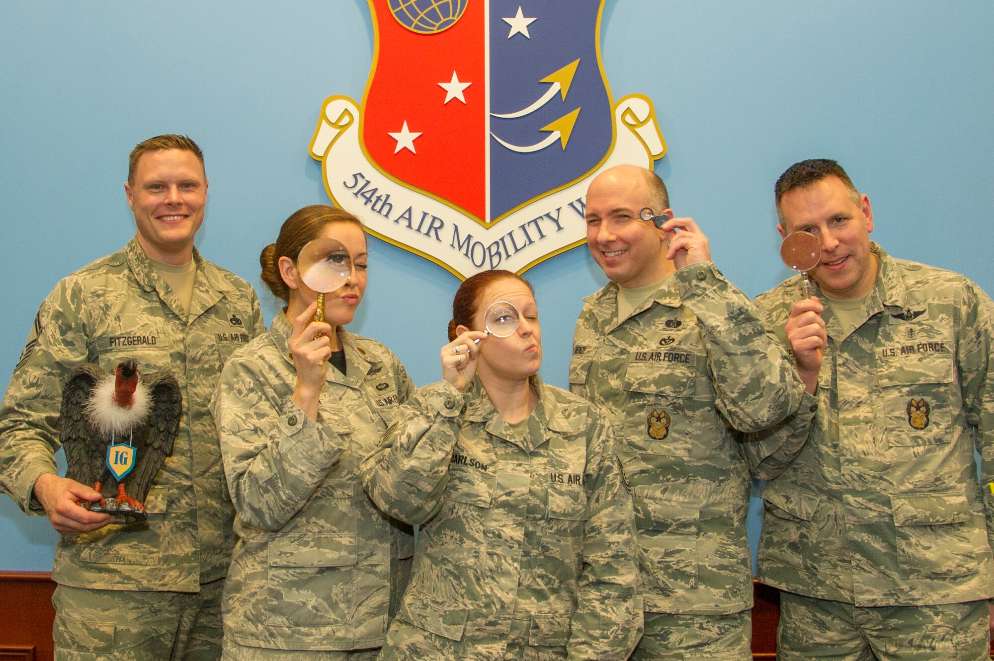 514th Air Mobility Wing Inspector General team pose for a photo in the wing conference room. The team won seven Air Force Reserve Command IG awards for 2017