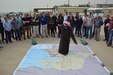 Soldiers of the Area Support Group-Kuwait listen to retired Brig. Gen. Faraj Esmail detail the Iraqi invasion, Kuwait Naval Base, Kuwait, March 1, 2018.