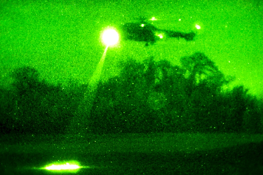 A NATO EC-725 Super Cougar helicopter prepares to land