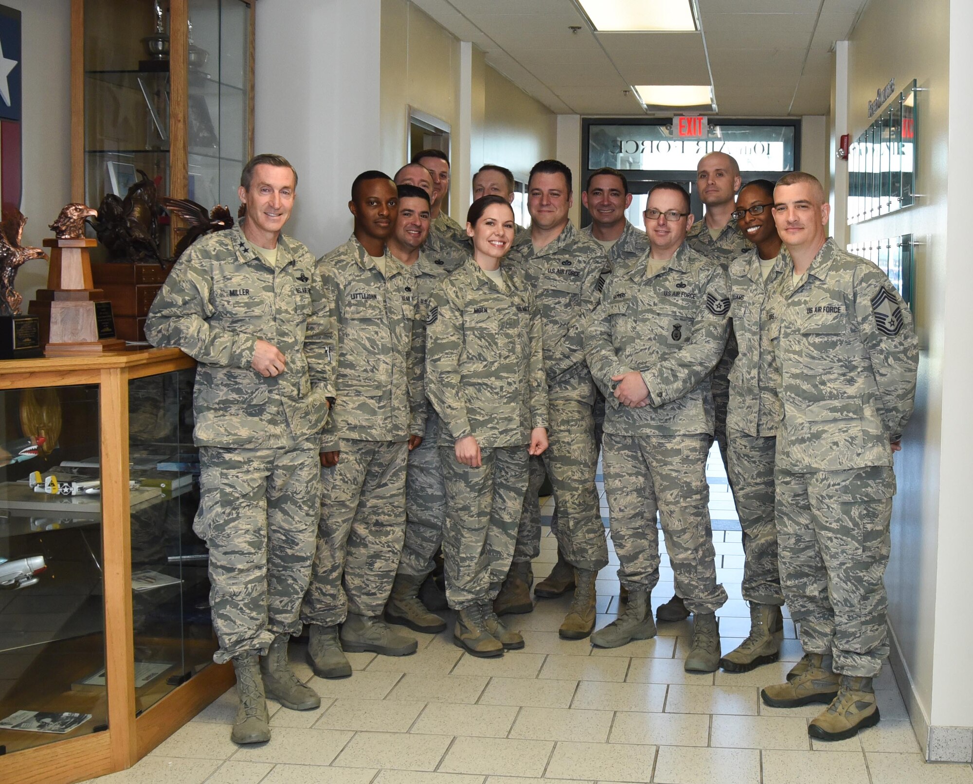 Maj. Gen. Ronald B. Miller, 10th Air Force commander, congratulates the 301st Fighter Wing Recruiting Flight on winning the Pacific category for the 2017 Individual Ready Reserve (IRR) Recruiting Challenge March 12, 2018 at Naval Air Station Fort Worth Joint Reserve Base, Texas. The flight placed 18 members from the IRR into the active Air Force Reserve, which surpassed 42 other recruiting units. The Air Force Reserve Command Commander and Air Force Reserve Chief Lt. Gen. Maryanne Miller issued the challenge to continue to build the command's experienced force. (U.S. Air Force photo by Melissa Harvey)