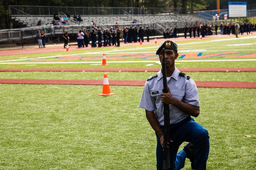 Cadet Allyja Trench, a student at South Gwinett High School in Atlanta, competes in the individual armed exhibition event the North Springs Charter High School Invitational Drill Meet. Grovetown High School were named overall team champions of the event. U.S. Army Soldiers from the 335th Signal Command (Theater), and Georgia Recruiting Battalion, U.S. Army Recruiting Command served as judges and mentors for  Georgia area Junior Reserve Officer Training Corps (JROTC) students from 13 high schools at the North Springs Charter High School Invitational Drill Meet held in Atlanta, Feb. 24, 2018. (U.S. Army Reserve photo by Capt. David Gasperson)