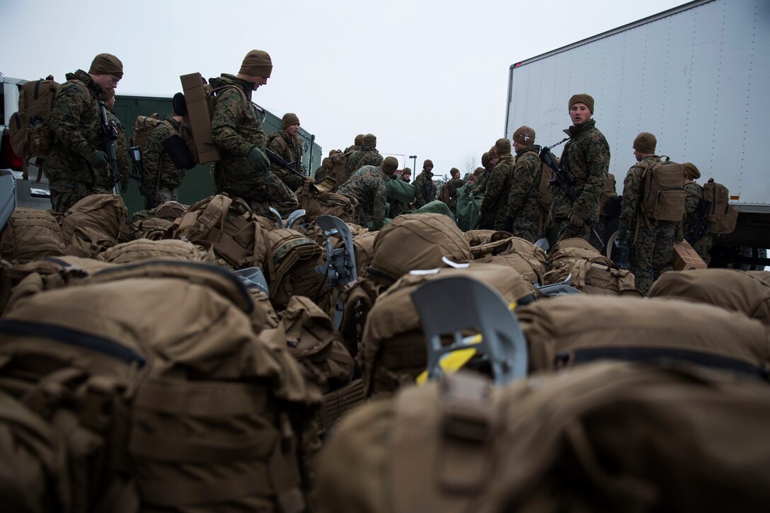 Marines move packs during a movement part of the exercise