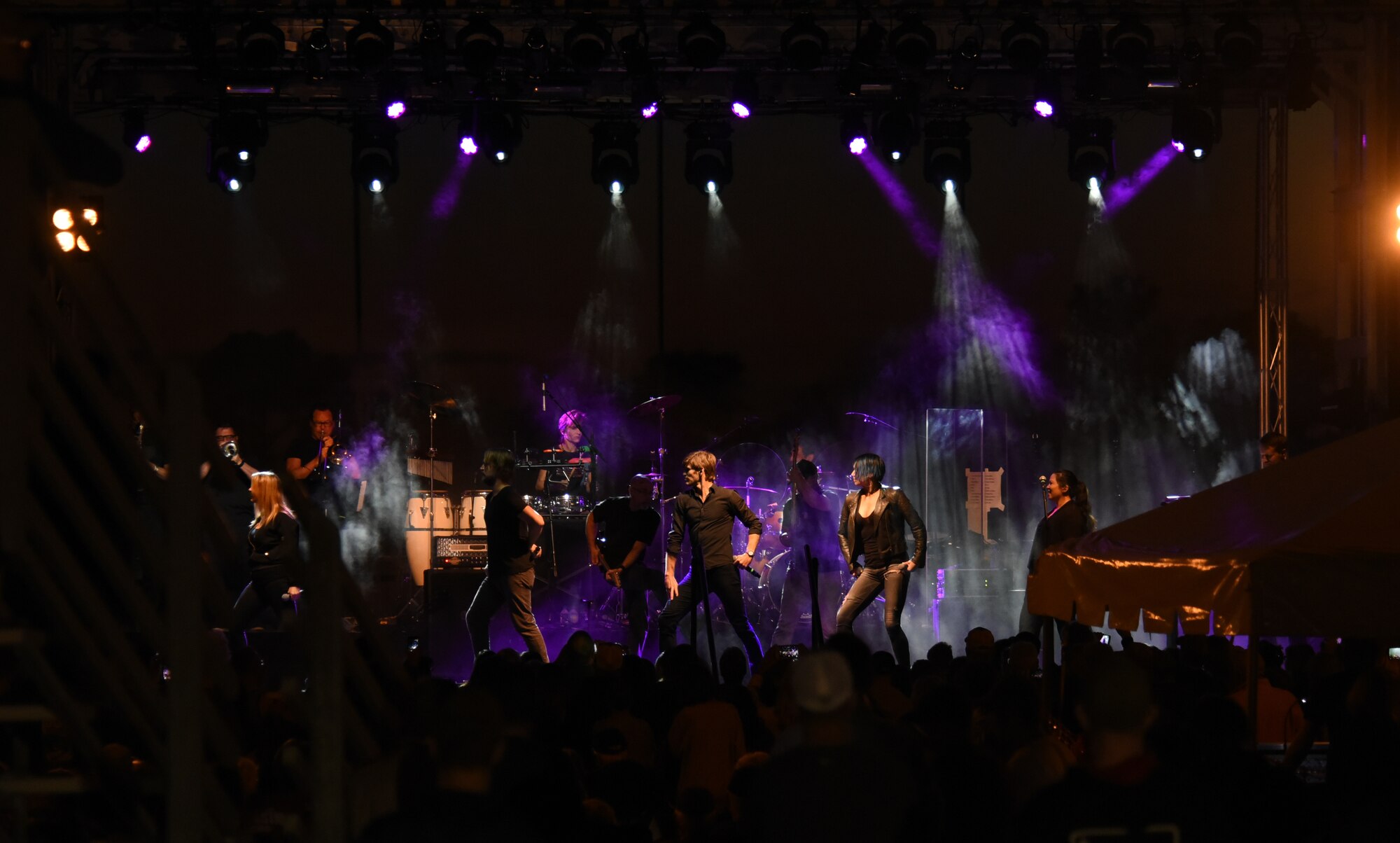 Gary Sinise and the Lt. Dan Band performs a song during a concert at Tyndall Air Force Base, Fla., March 4, 2018. During the concert, the band began playing as the sun set, and continued into the early evening. The Gary Sinise Foundation, the parent organization of the band states, “Whether boosting morale on military bases at home and abroad or raising awareness at benefit concerts across the country, the band entertains, educates, inspires and builds communities with its explosive live show everywhere it goes.” (U.S. Air Force photo by Airman 1st Class Solomon Cook/Released)