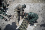 9th ESB EOD Marines work alongside Royal Thai service members to dispose of UXO