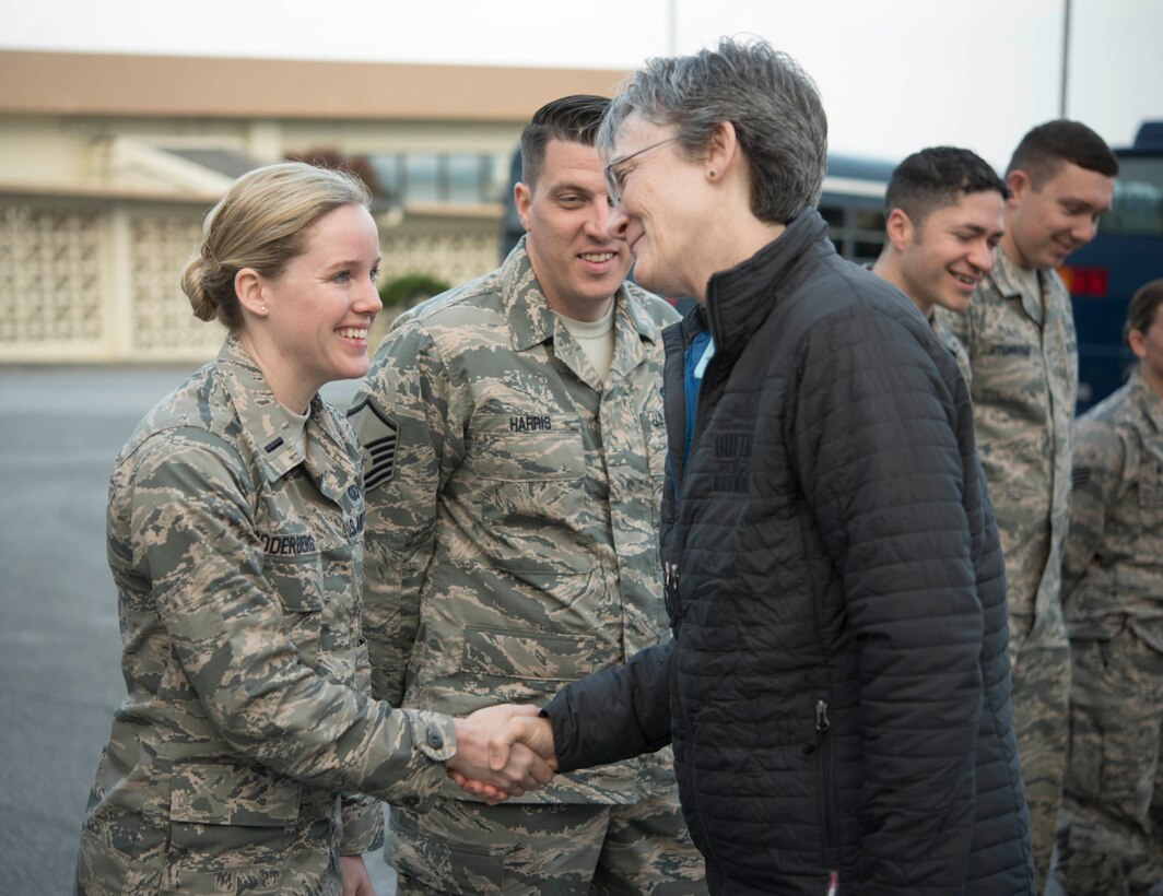 Air Force Secretary Heather Wilson meets Air Force 1st Lt. Laura Soderbergat during a visit to Kadena Air Base, Japan.