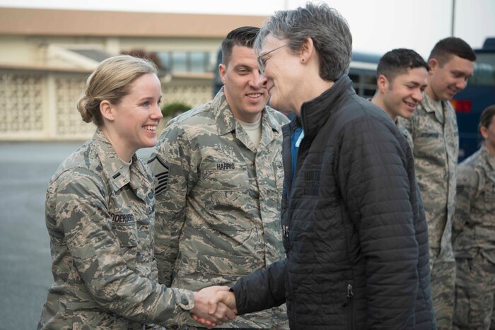 Air Force Secretary Heather Wilson meets Air Force 1st Lt. Laura Soderbergat during a visit to Kadena Air Base, Japan.