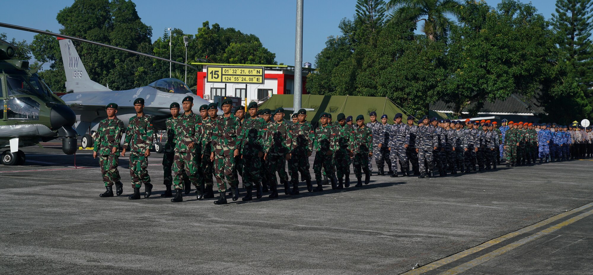 Members from the U.S. Air Force and Indonesian military participate in the exercise Cope West 18 (CW18) opening ceremony at Sam Ratulangi International Airport, Indonesia, March 12, 2018.