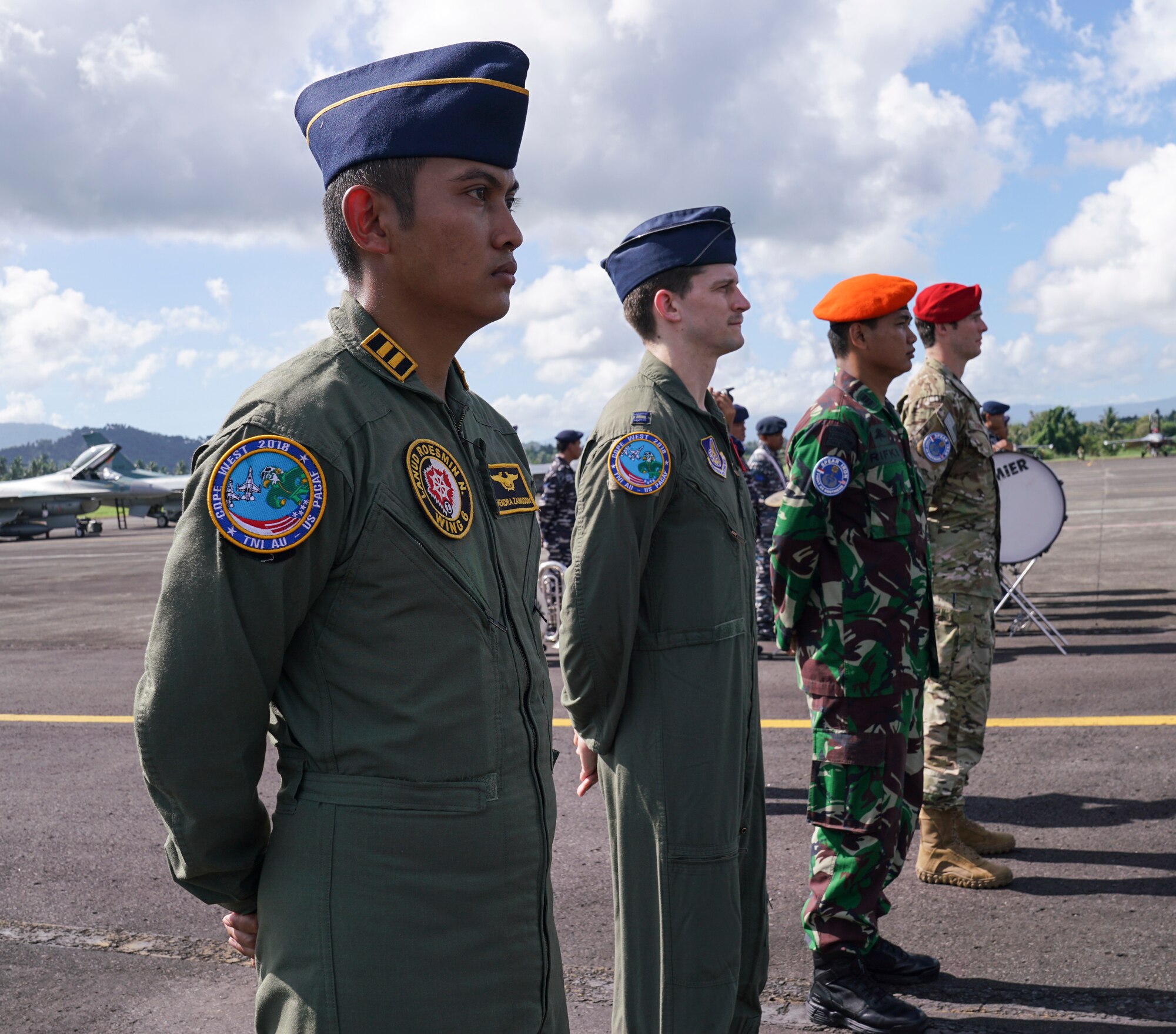 Members from the U.S. Air Force and Indonesian military participate in the exercise Cope West 18 (CW18) opening ceremony at Sam Ratulangi International Airport, Indonesia, March 12, 2018.