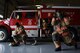 U.S. Air Force Airmen 1st Class Nicholas Denning, left, and Trevor Britt, 20th Civil Engineer Squadron firefighters, don their gear during a competition demonstrating their proficiency at Shaw Air Force Base, S.C., March 8, 2018. After receiving notification of an emergency, the Airmen must be prepared to depart the station and provide as quick of a response as possible. (U.S. Air Force photo by Airman 1st Class Kathryn R.C. Reaves)
