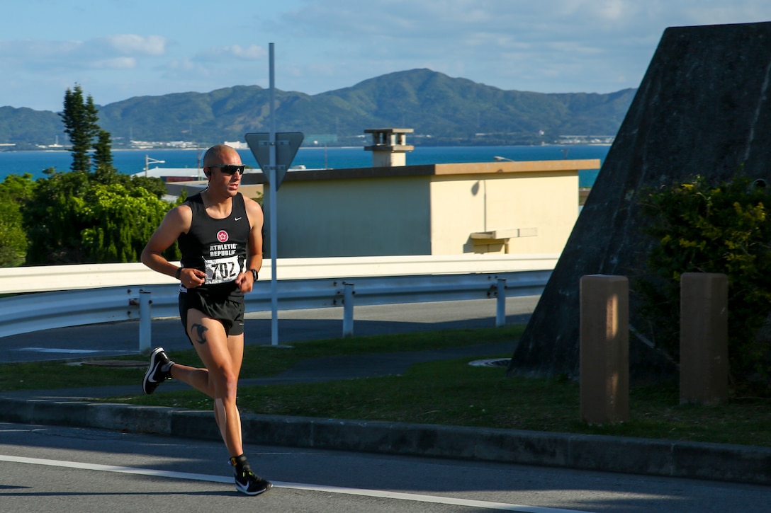 2nd Lt. Payton Nevills runs the first lap of the 10-kilometer route during the Lord of Tegan Run March 11 aboard Camp Courtney, Okinawa, Japan. The annual race invited the local community on base for a friendly fun-run. Nevills, a logistics officer with 3rd Medical Battalion, was the winner of the 10km race. (U.S. Marine Corps photo by Pfc. Nicole Rogge)