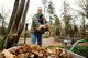 U.S. Air Force Chief Master Sgt. Philip Leonard, Ramstein Area Chief’s Group member, transfers leaves into a wheel barrow while cleaning up the American Kindergraves in Kaiserslautern, Germany, March 10, 2018. The Ramstein Area Chief’s Group has taken care of the Kindergraves with the German-American Women’s Organization since the 1980s. (U.S. Air Force photo by Senior Airman Devin Boyer)